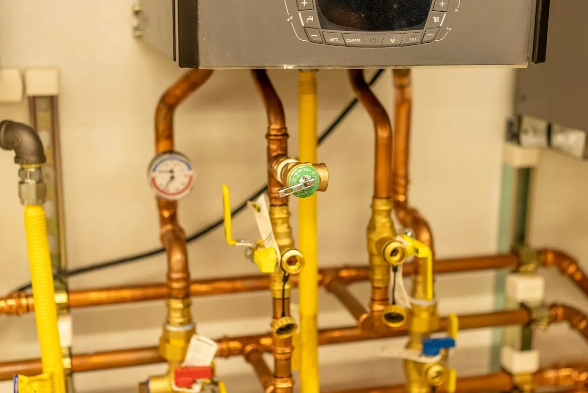 Licensed technician providing Backflow Prevention for a homeowner in Hermon